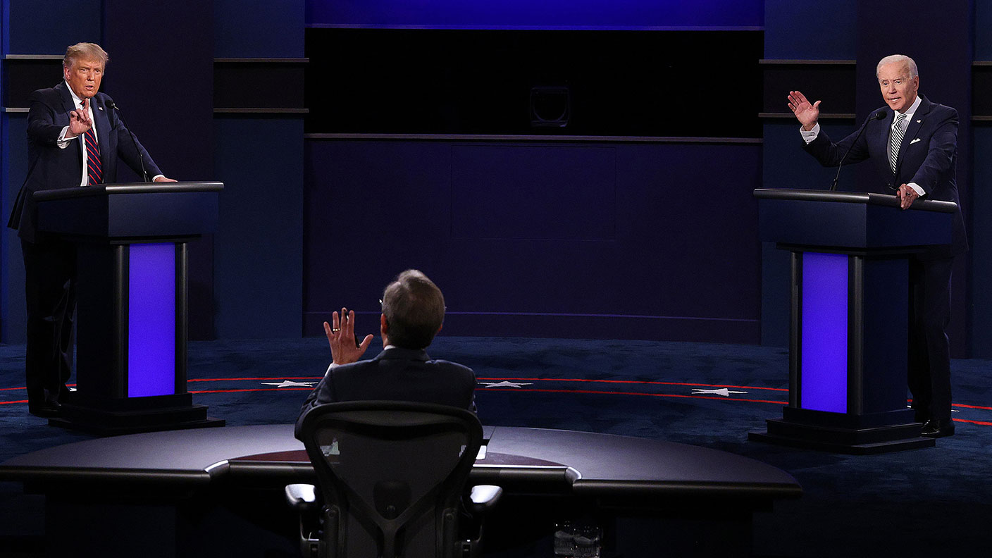 Donald Trump and Joe Biden debating © Scott Olson/Getty Images