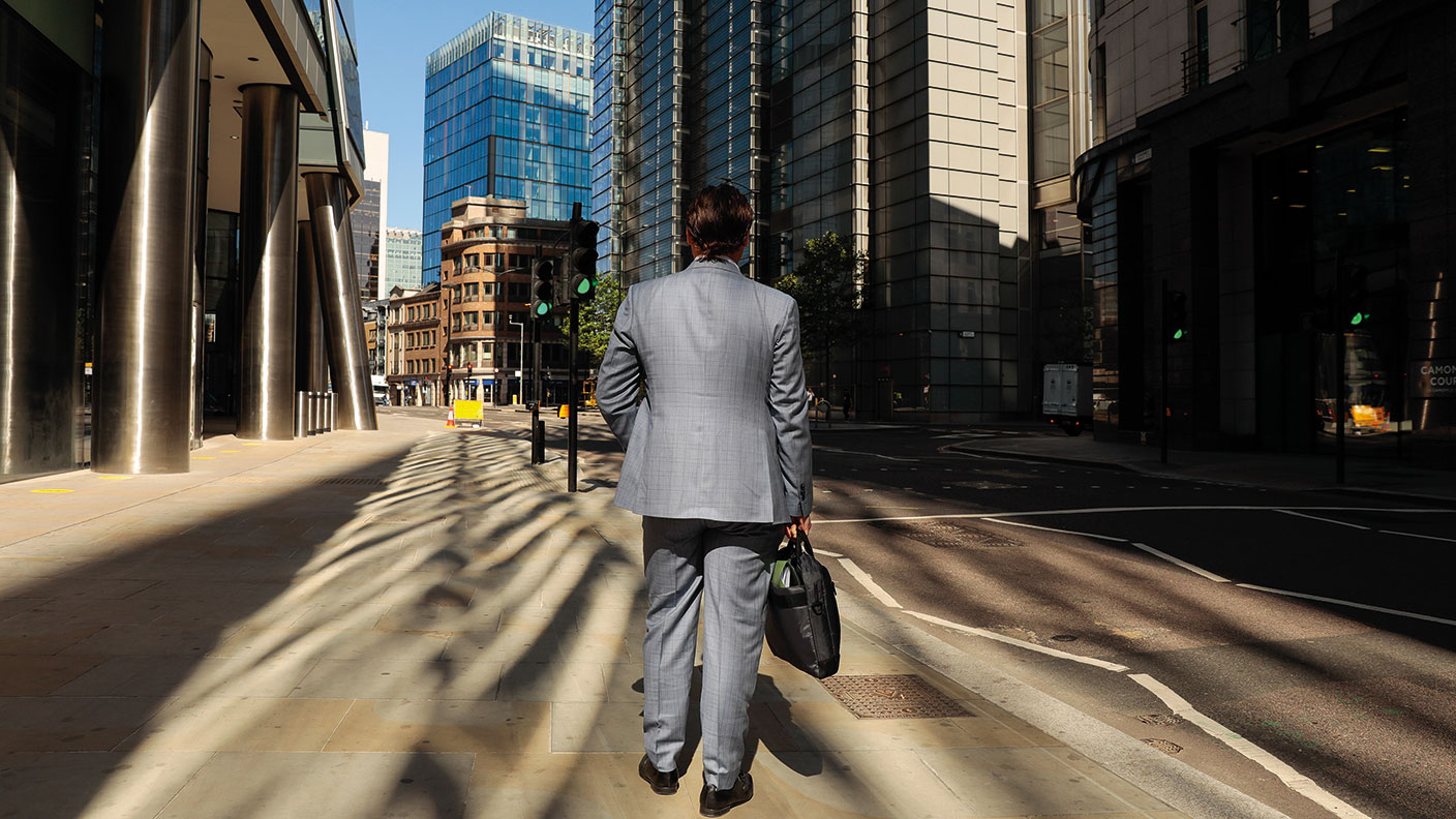 Businessman on an empty street in the City © Jason Alden/Bloomberg via Getty Images