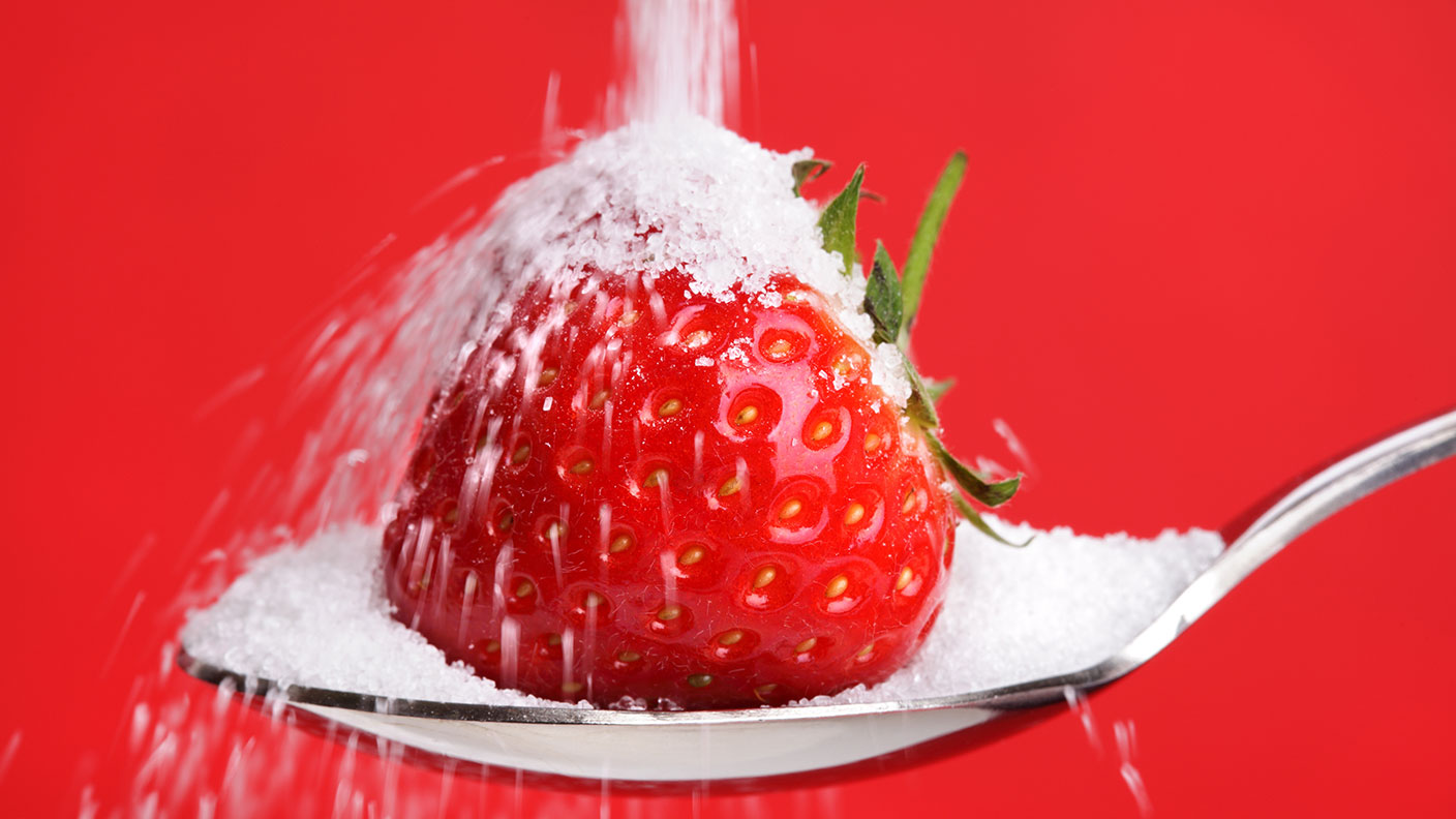 Strawberry covered in sugar