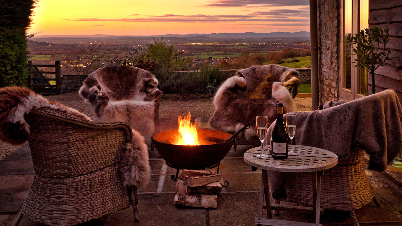 Fire pit on a balcony overlooking countryside