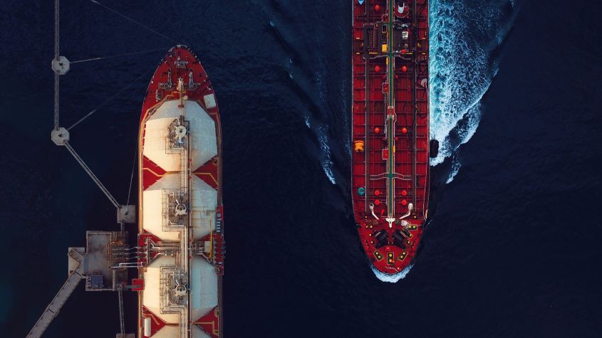 Aerial view of a liquified natural gas tanker and a crude oil tanker