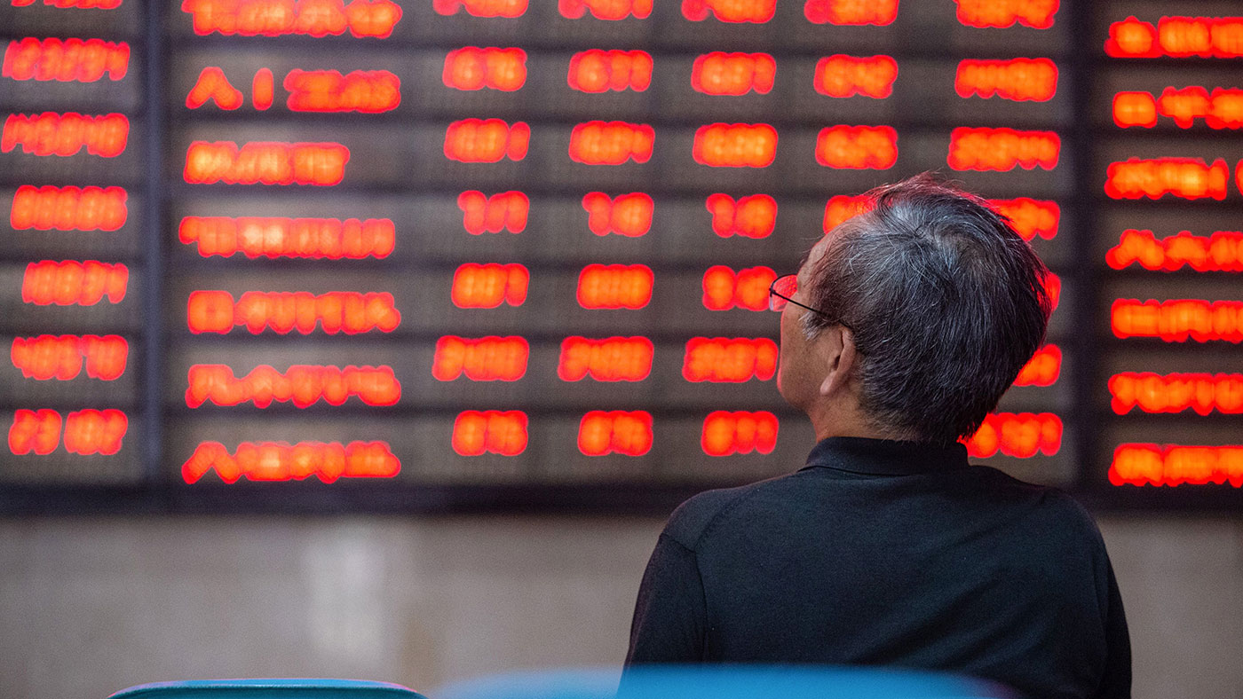 Investor in China © STR/STR via Getty Images