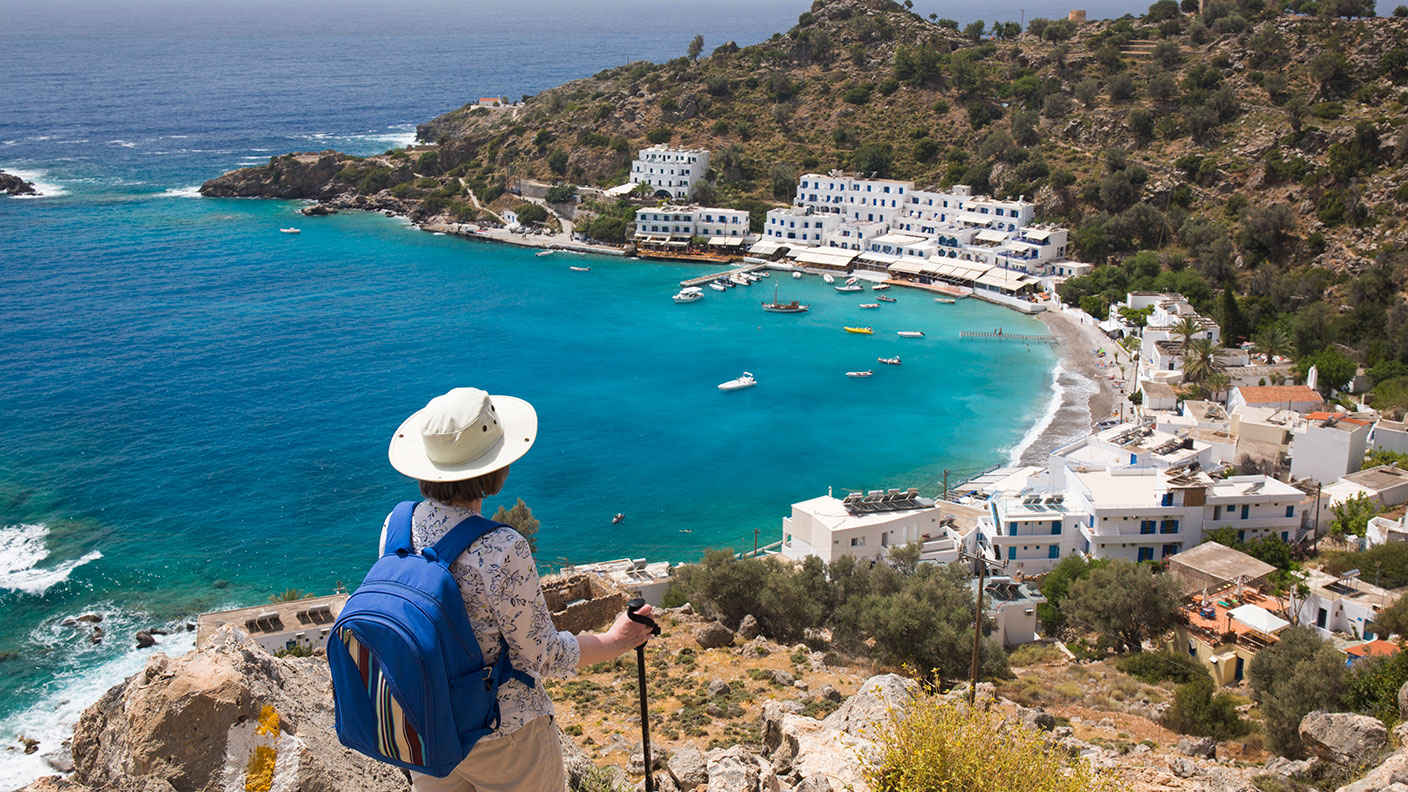 Hiker admiring view in Crete