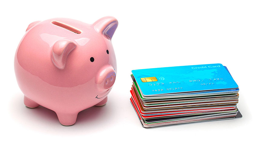 Piggy bank and credit cards