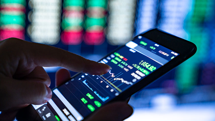 phone screen showing stock market charts