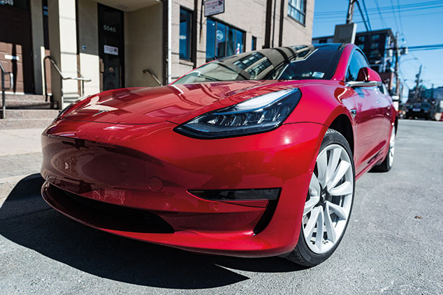 Tesla Model 3 plug-in electric car © iStockphotos