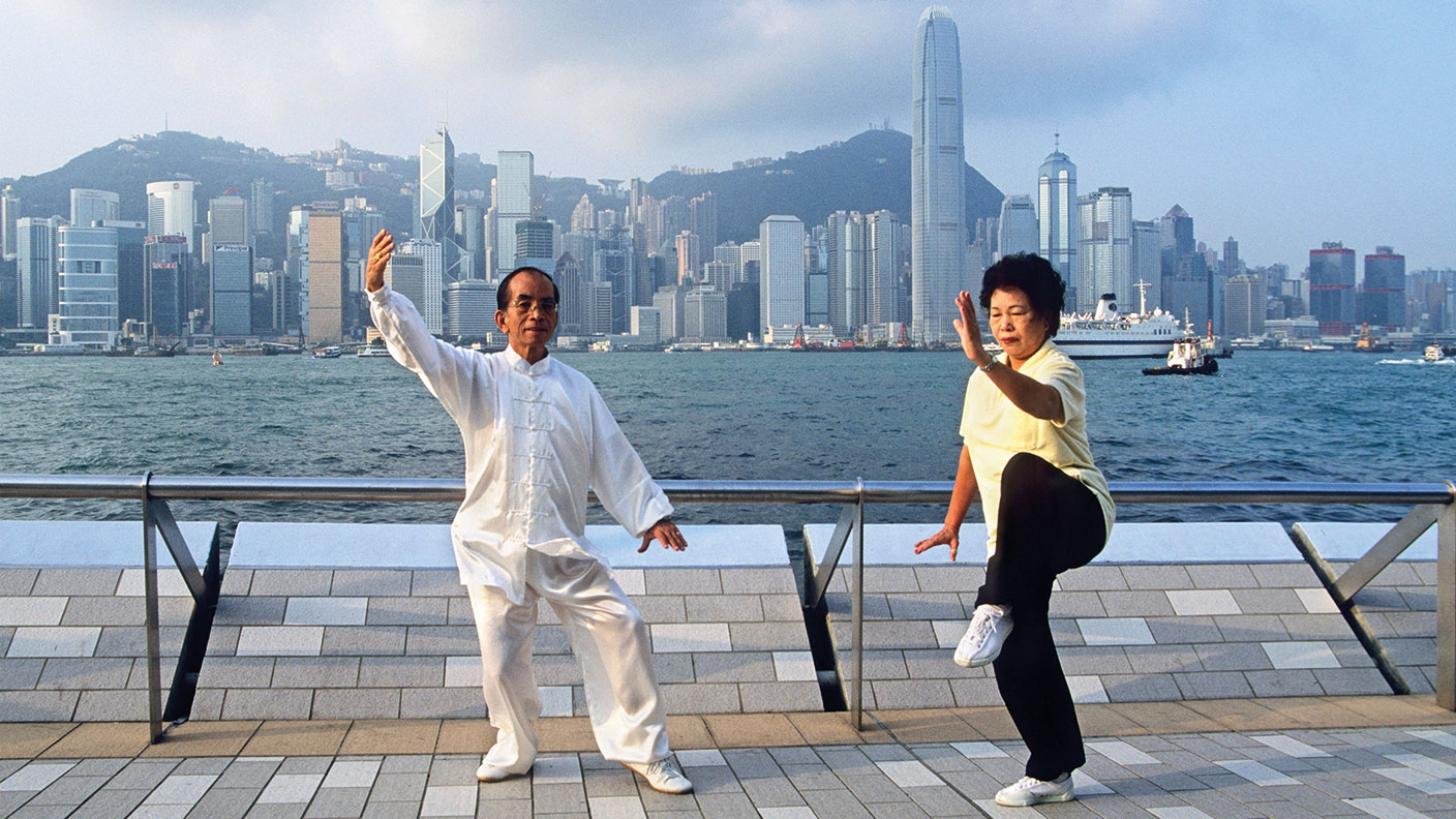 People practising Tai Chi in Hong Kong © Alamy
