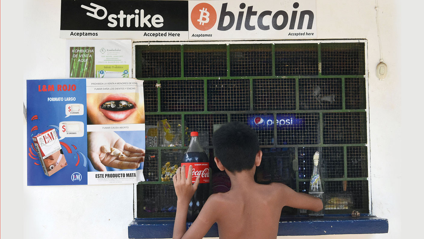 Bitcoin sign on a shop in El Salvador