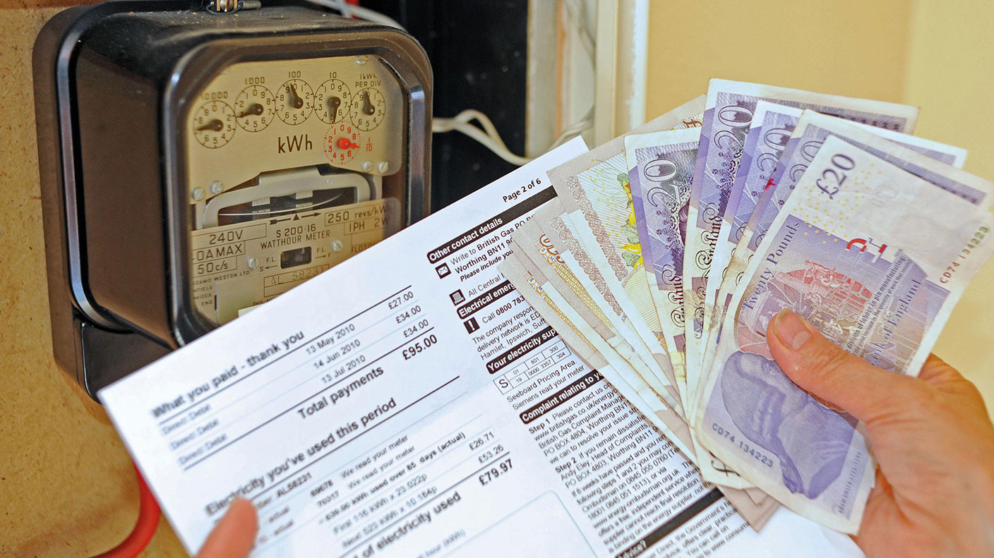 Electricity meter, bill and a handful of £20 notes