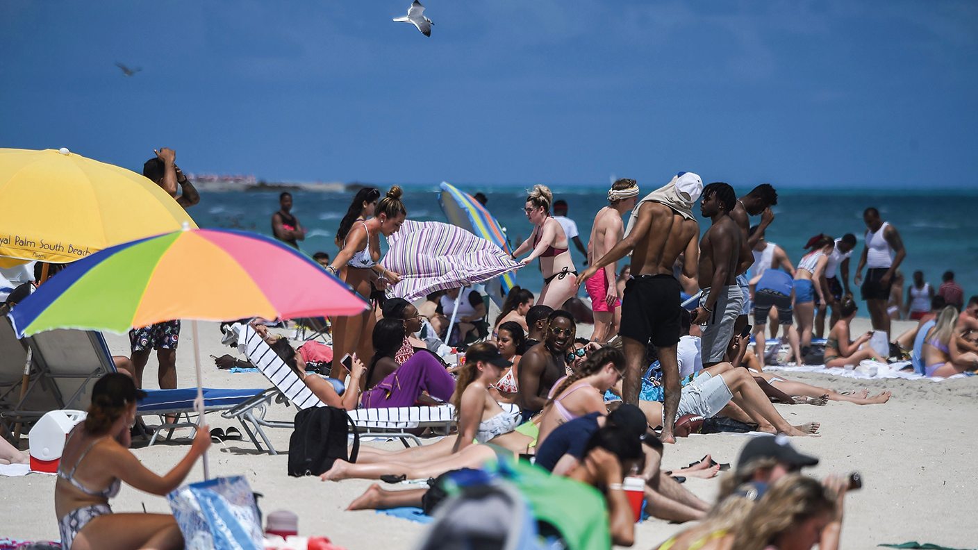 People on Miami Beach © AFP via Getty Images