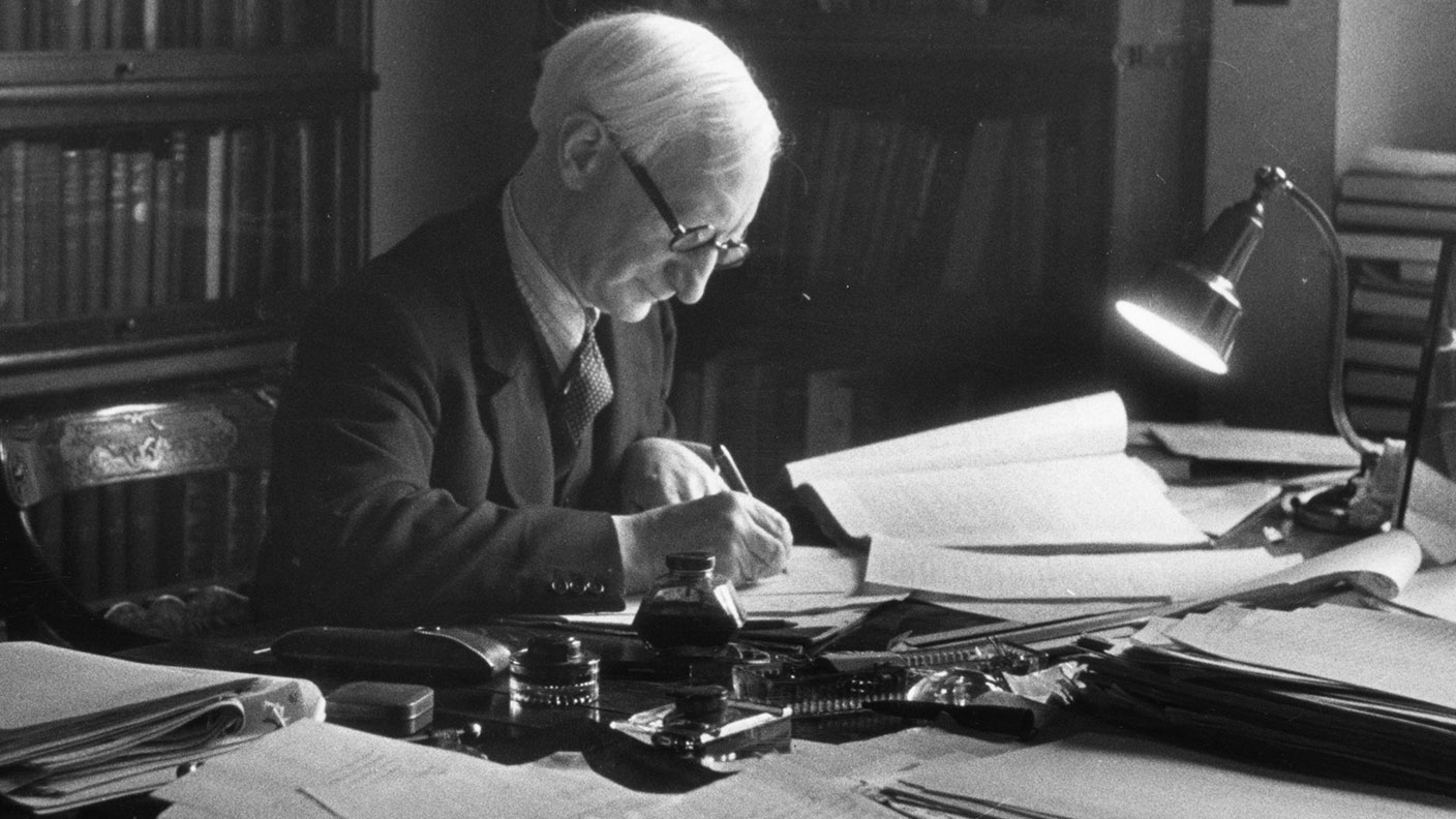 William Beveridge at his desk