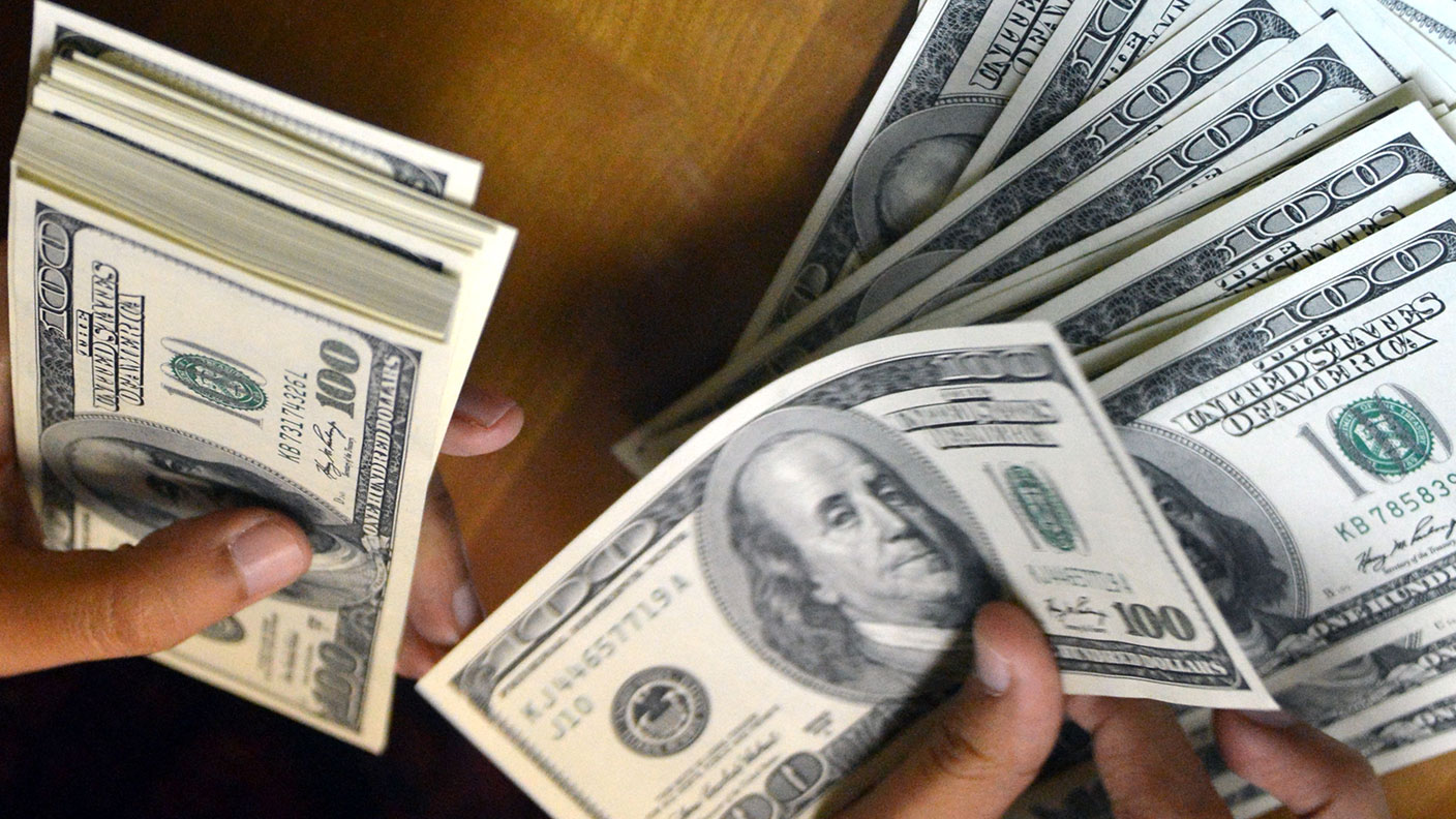 A fistful of dollars © BAY ISMOYO/AFP via Getty Images