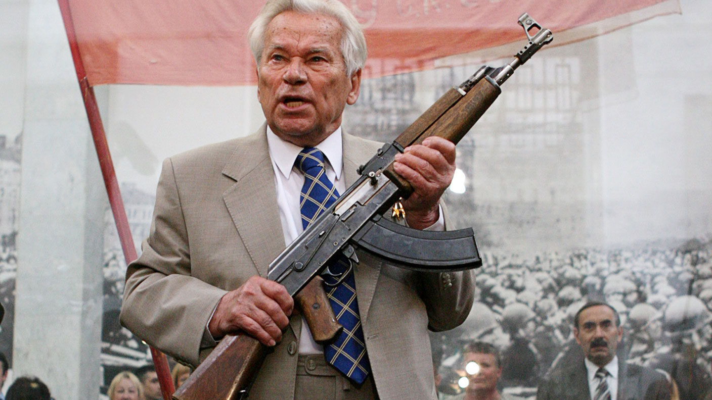 Mikhail Kalashnikov with an AK-47 